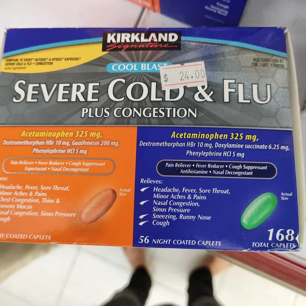 Kirkland Signature Severe Cold & Flu Plus Congestion Day caplet: Acetaminophen 325 mg / Dextromethorphan HBr 10 mg / Guaifenesin 200 mg / Phenylephrine HCl 5 mg; Night caplet: Acetaminophen 325 mg / Dextromethorphan HBr 10 mg / Doxylamine succinate 6.25 mg / Phenylephrine HCl 5 mg