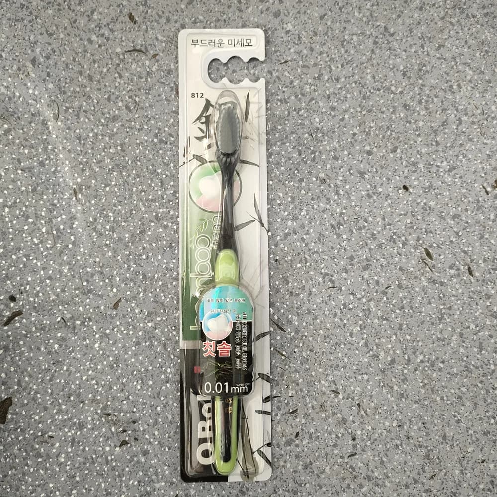 O Bok+ Charcoal Toothbrush Model 812; ultra-fine 0.01 mm bristle tips