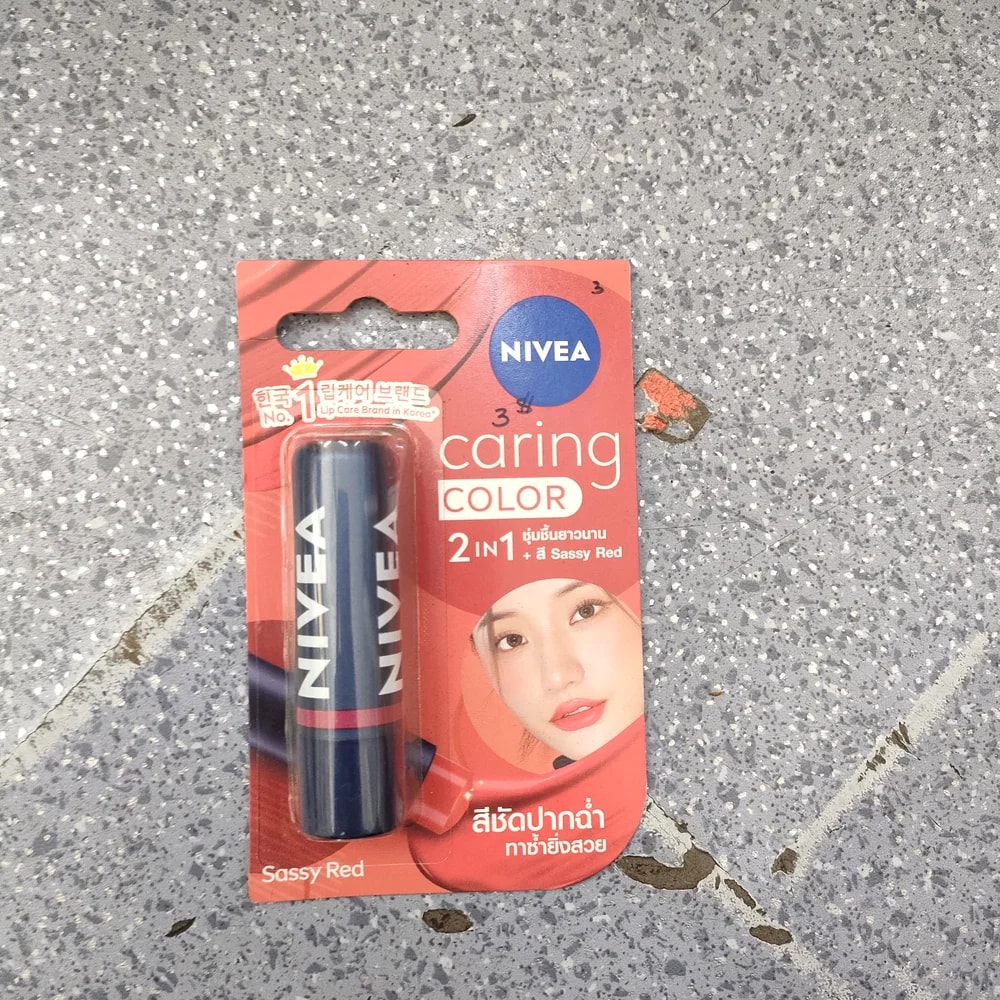 NIVEA Caring Color 2-in-1 Lip Care (Sassy Red) 4.8 g per stick - Depot De Pharmacie "A" Kim Houy