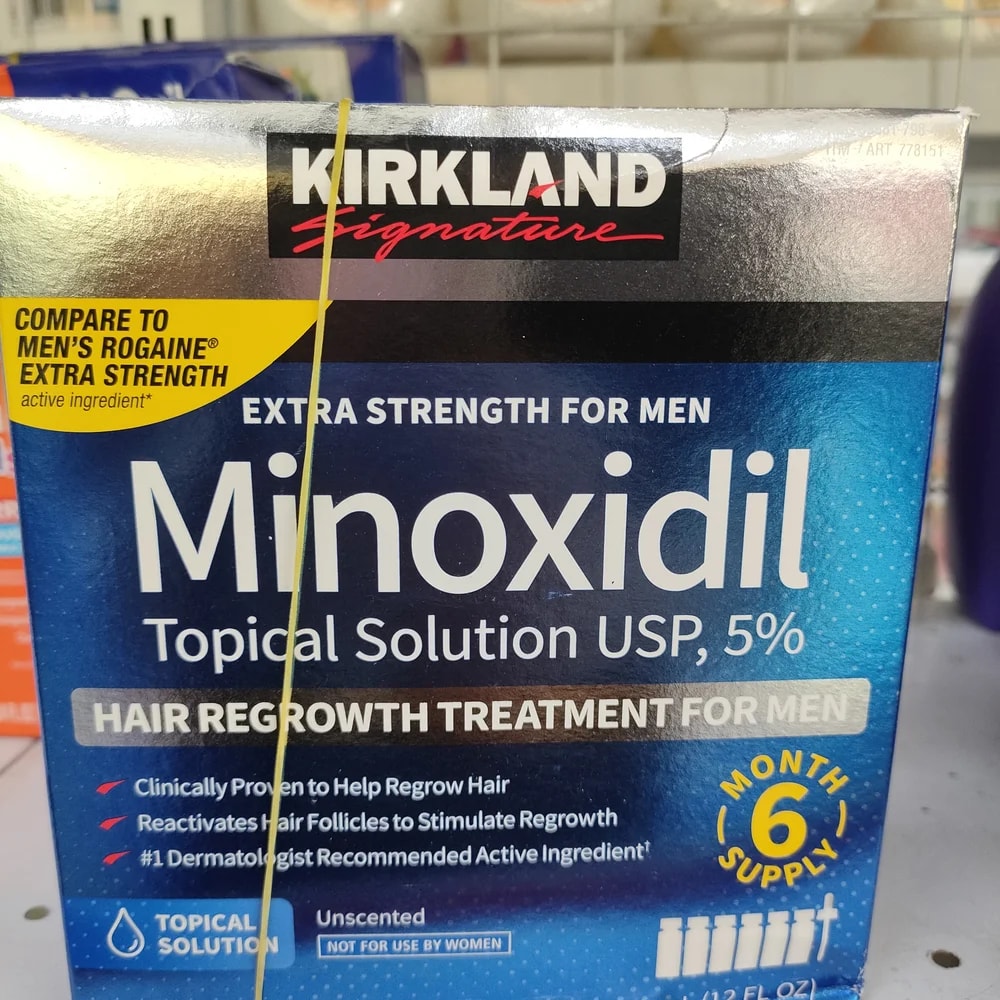 Kirkland Signature Minoxidil 5% Topical Solution Minoxidil 5% w/v; 6 x 60 mL bottles per box (6-month supply, total 360 mL) - Depot De Pharmacie "A" Kim Houy