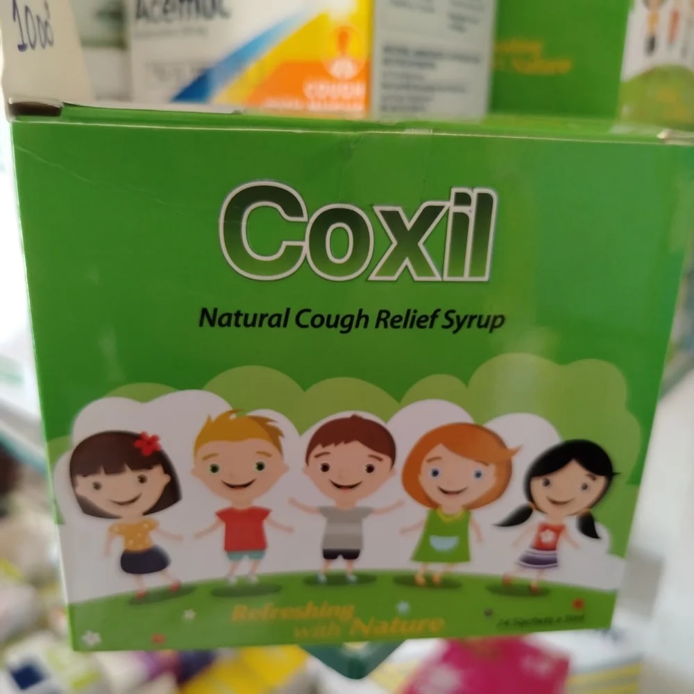 Coxil Natural Cough Relief Syrup Per 5 ml sachet: Cibotium barometz 0.25 g, Lobelia leaf 0.50 g, Ginger 0.25 g, Mulberry oil, Oroxylum indicum extract 100 mg - CHEANIMUL PHARMACY