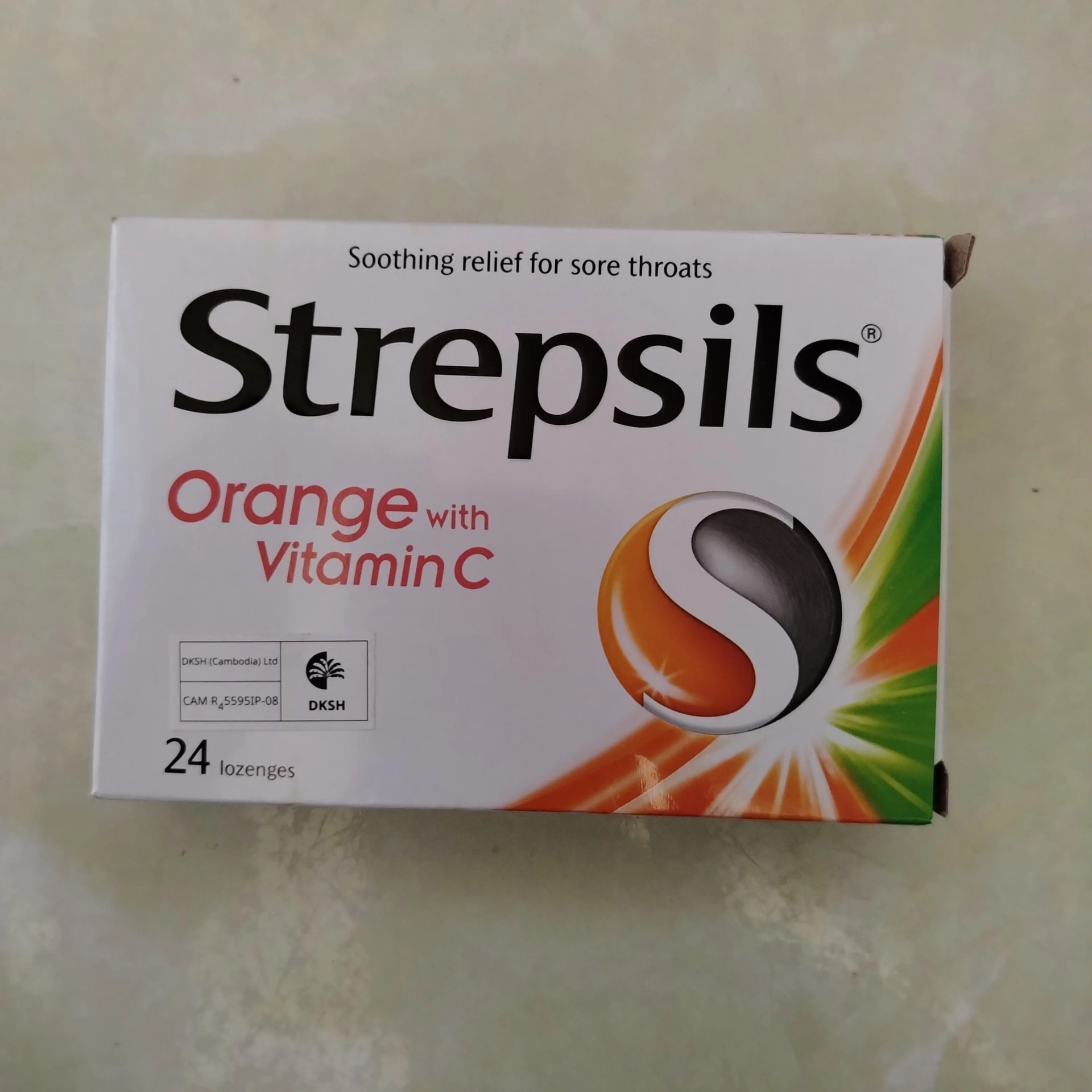 Strepsils Orange with Vitamin C Dichlorobenzyl alcohol 1.2 mg / Amylmetacresol 0.6 mg / Vitamin C 100 mg per lozenge - Phal Cham Rouen