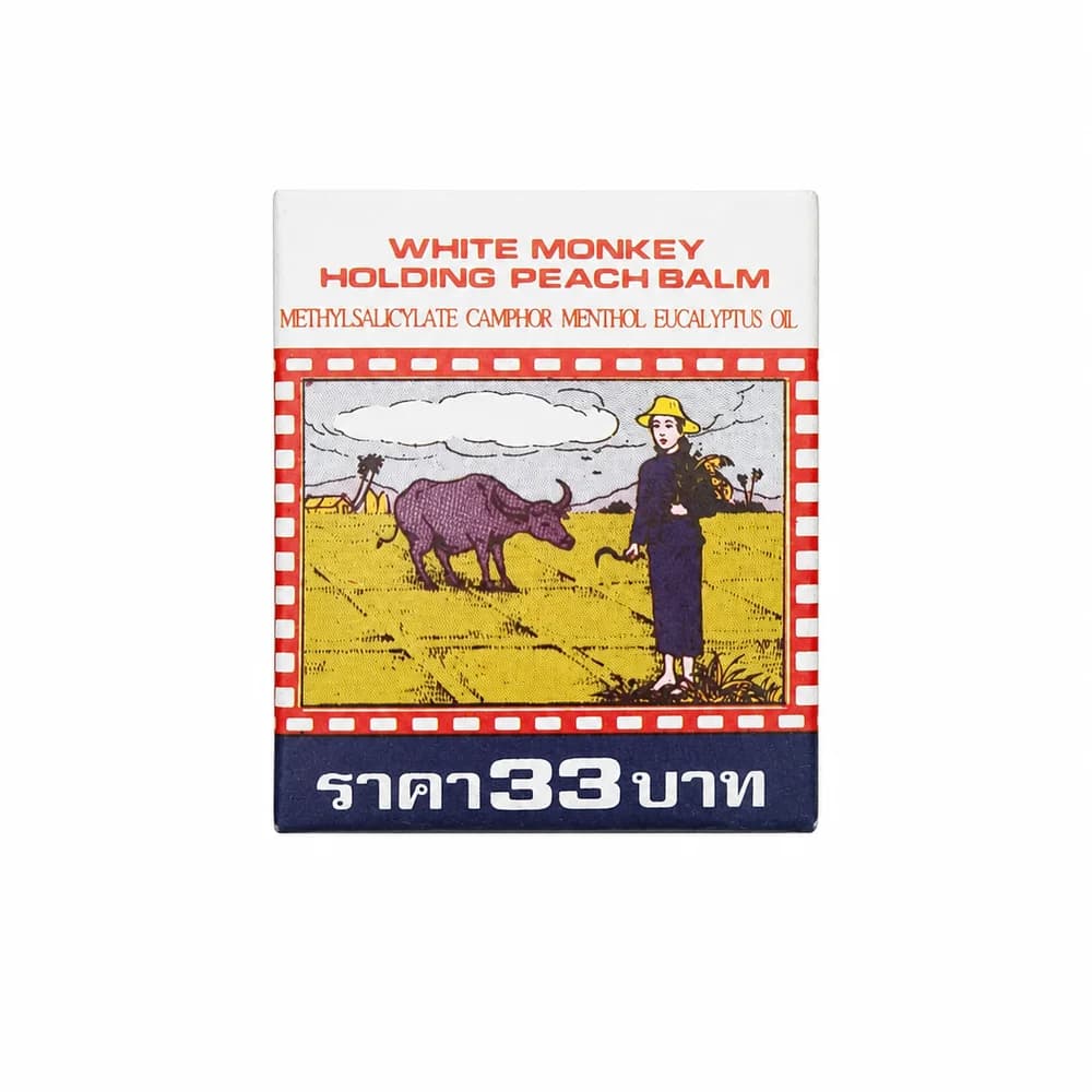 White Monkey Holding Peach Balm Methyl salicylate 3.0% w/w; camphor 22.0% w/w; menthol 19.0% w/w; eucalyptus oil 3.0% w/w; cinnamon oil 0.80% v/v; peppermint oil 0.70% v/v; clove oil 0.70% v/v