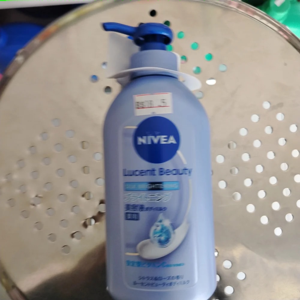 NIVEA Lucent Beauty Silk Brightening Body Milk - Pharmacy Krech hong