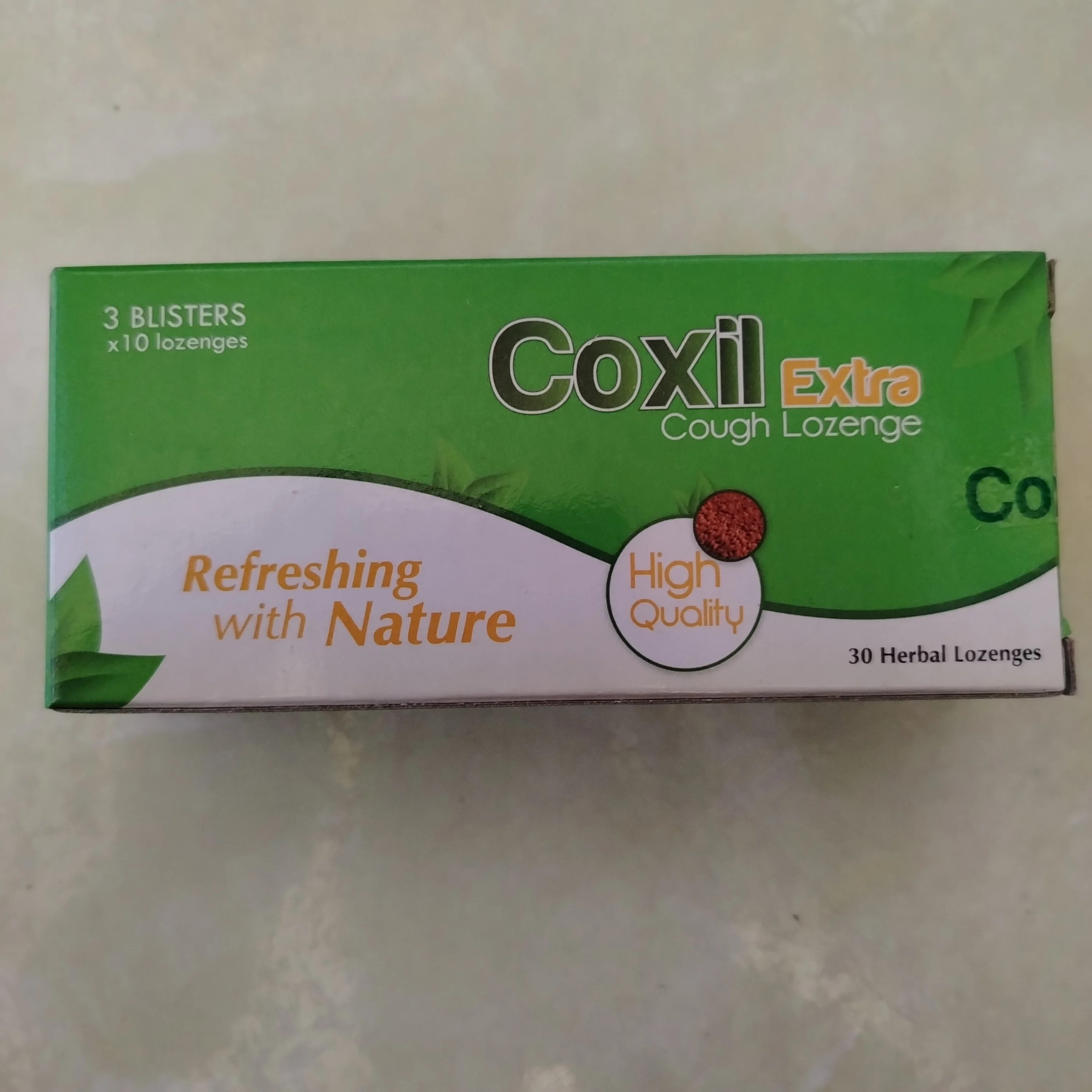 Coxil Extra Cough Lozenge — available at pharmacies in Cambodia on PharmKulen