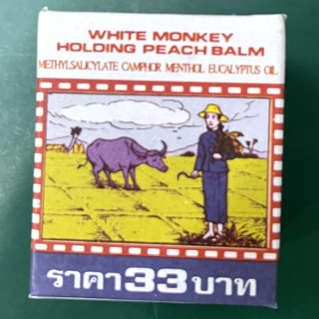 White Monkey Holding Peach Balm — available at pharmacies in Cambodia on PharmKulen