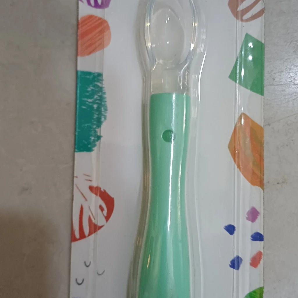 Baby silicone spoon — available at pharmacies in Cambodia on PharmKulen